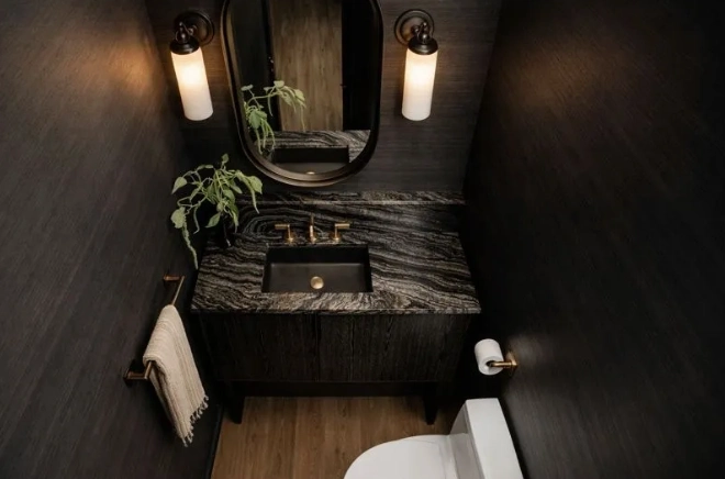 Close-up of elegant vanity with round mirror and warm lighting